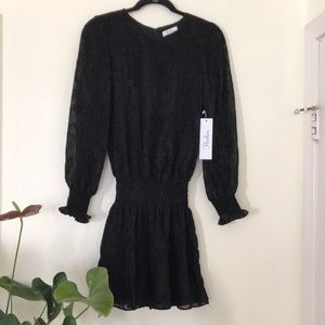 Parker black velvet striped burnout with elastic waist and wristbands.  Size S